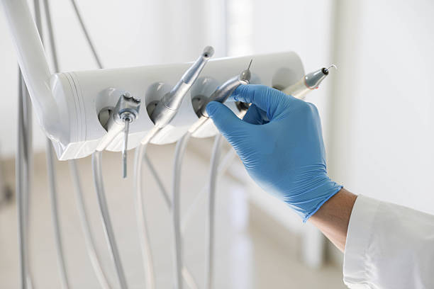 Professional Tooth Extraction technician working in Crystal Lake, FL
